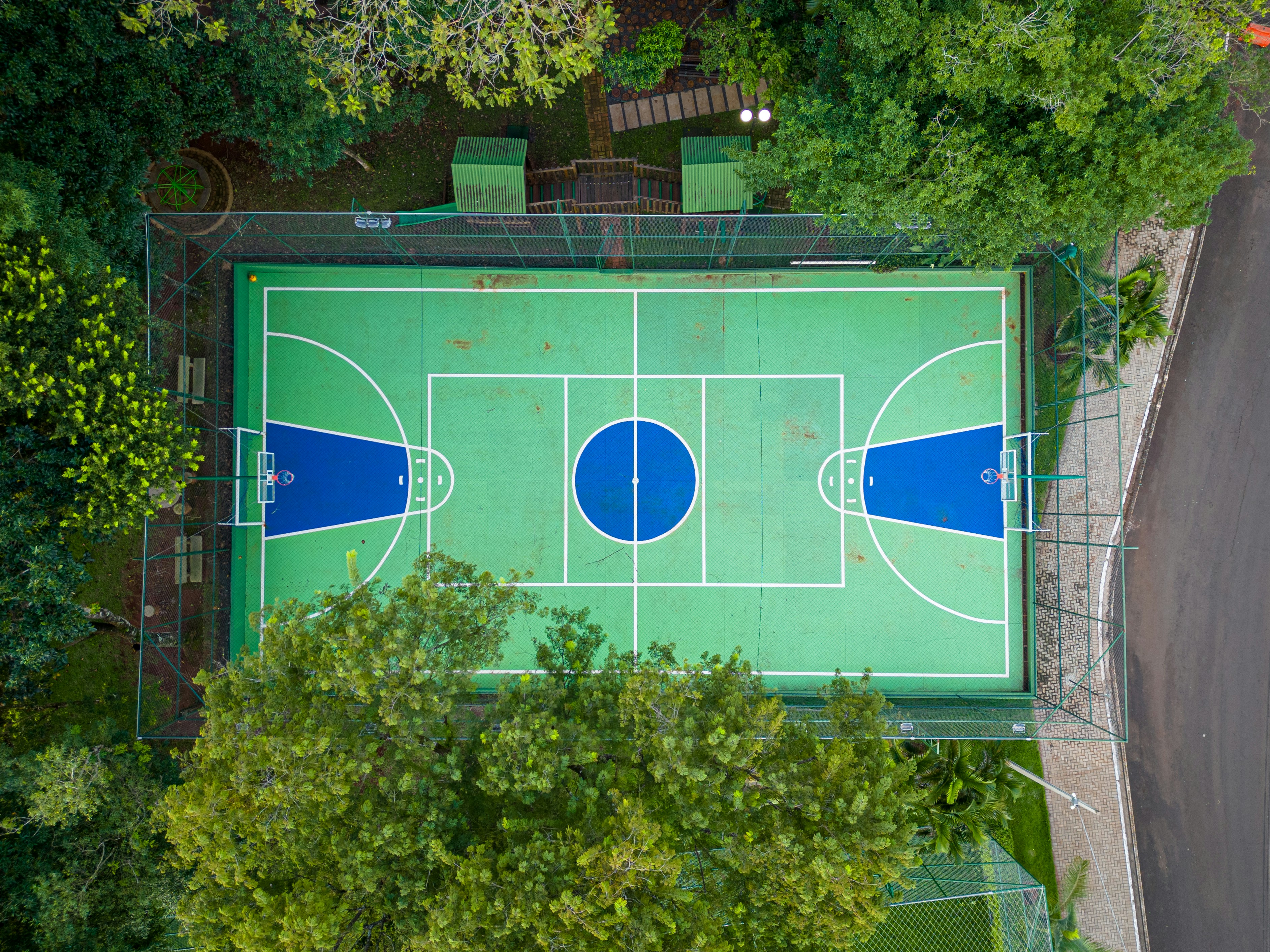Overhead picture of sports court that contains a pickleball court